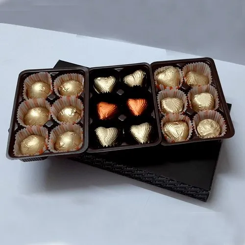 Deliver exclusive gift hamper of cadbury chocolates with red roses bouquet  to Ahmedabad Today Free Shipping  AhmedabadOnlineFlorists