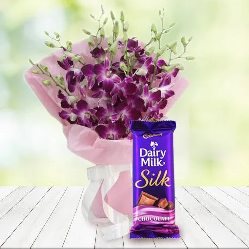 Deliver Orchids Bouquet and Cadbury Dairy Milk Silk