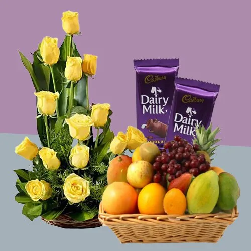 Deliver Yellow Roses Arrangement with Fruits Basket and Dairy Milk Silk