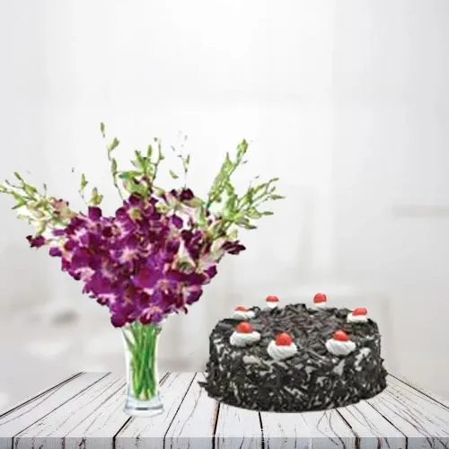 Cherishing Combo of Blue Orchids in Vase n Black Forest Cake