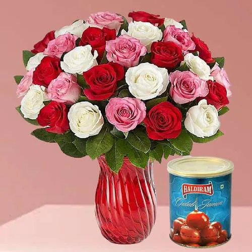 Terrific Combo of Mixed Roses in Vase with Haldiram Gulab Jamun