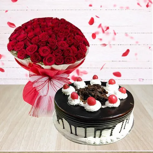 Book Arrangement of Red Roses N Black Forest Cake Online
