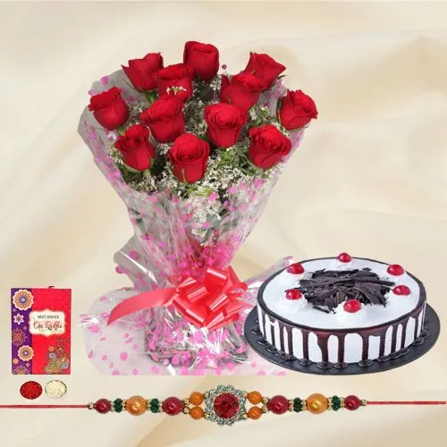 Beautiful Gift of Ambrosial Black Forest Cake accompanied with a Bunch of 12 Red Roses