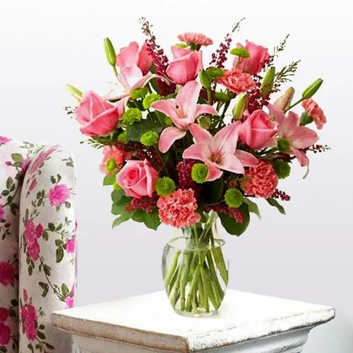 Deliver Online Lilies, Roses and Carnations Arrangement in a Glass Vase