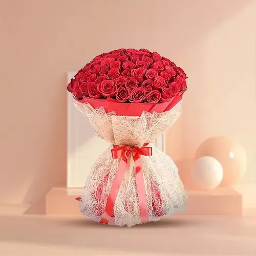 Elegant Red Roses Bouquet in Red Paper N White Jute Wrapping
