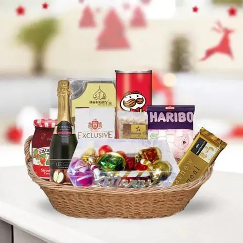 Wholesome Sweet N Savory Gift Basket for Anniversary Celebration<br>