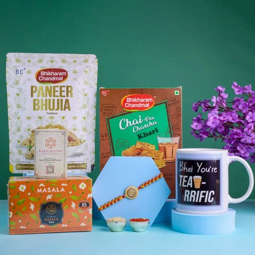Stunning Rakhi with Gourmet Snacks N Mug Hamper