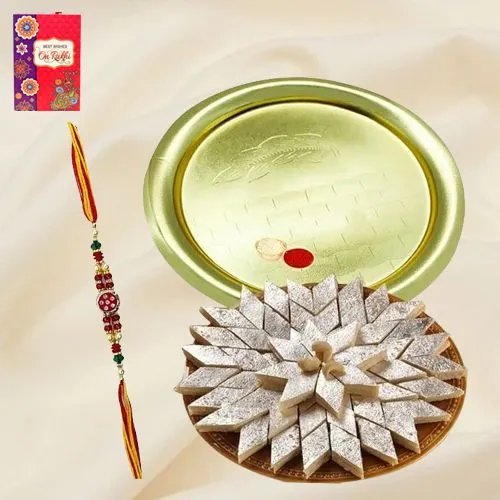 Kaju Katli and Silver Plated Puja Thali along Rakhi, Roli, Tilak and Chawal